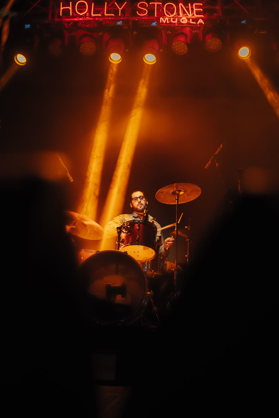 Band bathed in pink light